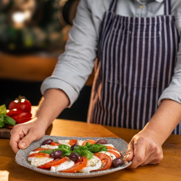 Chef serving a salad